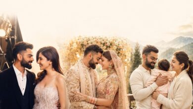 Virat Kohli and Anushka Sharma sharing a happy moment during a public appearance