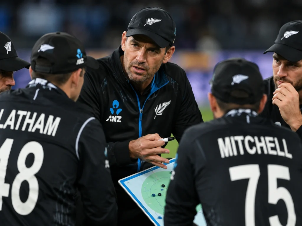 Stephen Fleming discussing tactics during an international cricket match